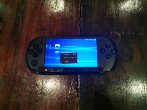 2 × Sony PSP consoles + Games and movies in good condition