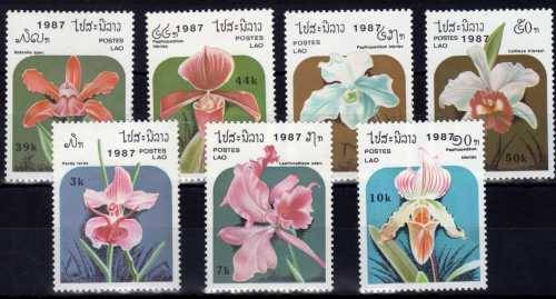LAOS 1987 ORCHIDS SET OF 7 & MINI SHEET LMM. SG 1004-1011. CAT 7 POUNDS.