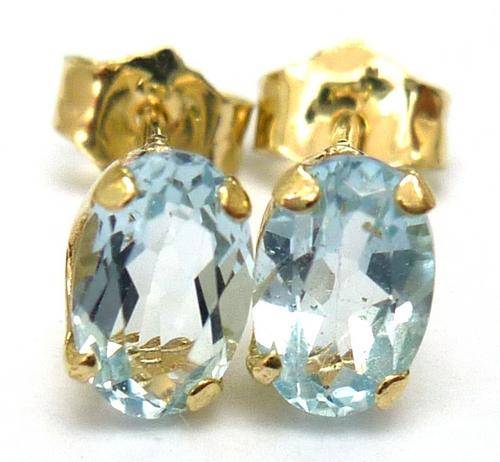 **STUNNING**9KT YELLOW GOLD OVAL 4 X 6 MM BLUE TOPAZ STUD EARRINGS