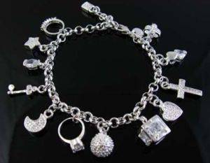 STERLING SILVER BRACELET - 13 CHARMS - NEW