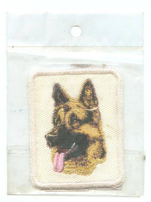 Embroidered SEW on khaki badge. GSD