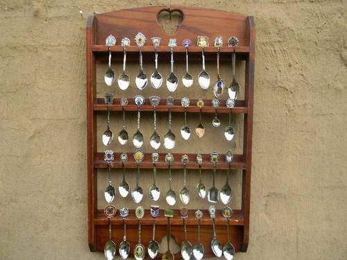 27 South Africa spoons in good condition with free rack