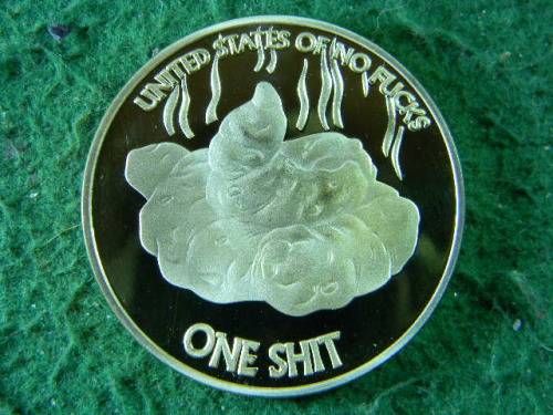 One dog Shit  (anus plumpsun) gold plated Souvenir  coin as per pictures comes in plastic holder