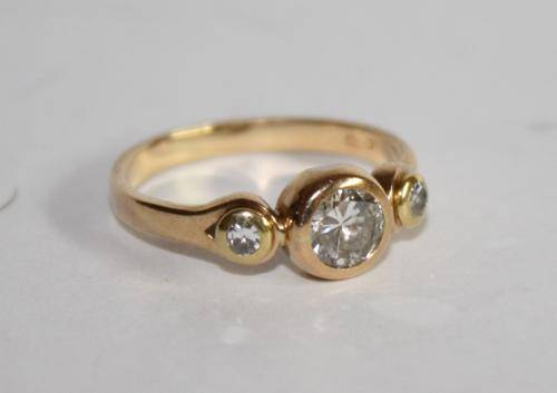 18ct Gold Diamond Ring set with 3 Diamonds-centre stone app .52ct.