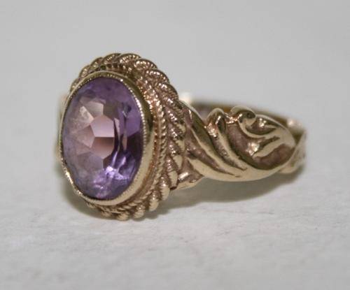 Amethyst Set in Gold Setting.