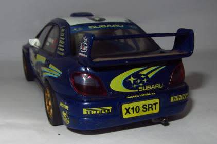 **Scalextric**Subaru Impreza WRC."Solberg Mills-6".As per Photos ...Not tested