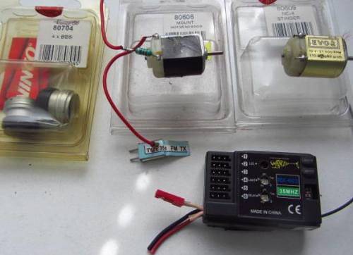**Slot Cars**..Motors(not sure if correct holder)...Plus Receiver-RX-603-35MHZ-Not Tested