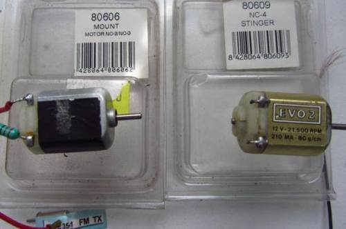**Slot Cars**..Motors(not sure if correct holder)...Plus Receiver-RX-603-35MHZ-Not Tested