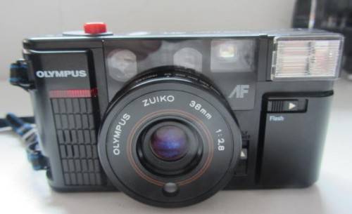 **Olympus AFL**-Quick Flash 35mm Camera0Zuiko 38mm f 2.8 Lens..Needs Battery..Not tested