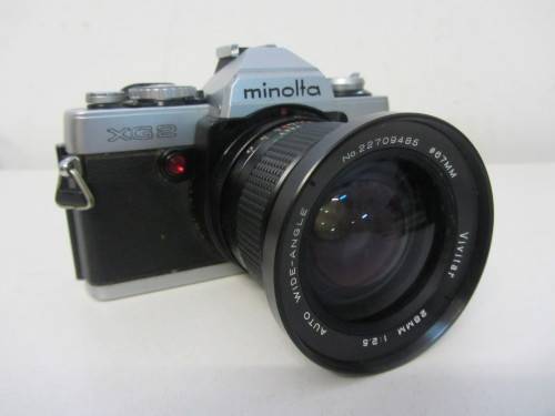 **Minolta XG-2**-Auto Wide-Angle 28mm 1:2.5 Vivitar Lens Plus Vivitar 70-150mm 1:3.8 Auto Zoom Lens