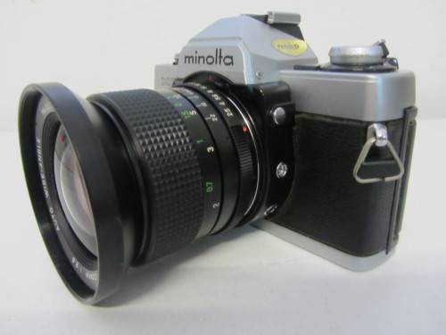**Minolta XG-2**-Auto Wide-Angle 28mm 1:2.5 Vivitar Lens Plus Vivitar 70-150mm 1:3.8 Auto Zoom Lens