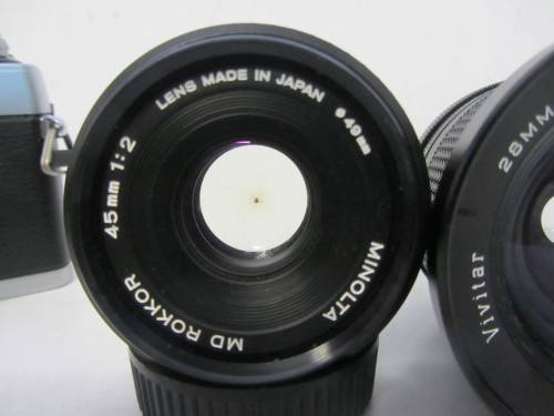 **Minolta XG-2**-Auto Wide-Angle 28mm 1:2.5 Vivitar Lens Plus Vivitar 70-150mm 1:3.8 Auto Zoom Lens