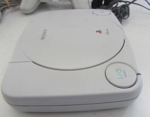 Sony Playstation  Console and Controller-As per Photos..Switches On.