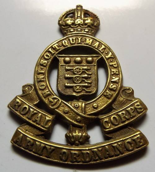 An awesome British WWII "Royal Army Ordnance Corps" brass cap badge with Kings Crown