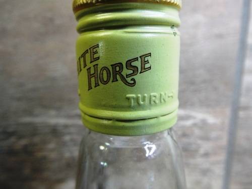 SUPER RARE ,,WHITE HORSE WHISKY  sealed bottle ,,,BOTTLED IN THE 1970s,
