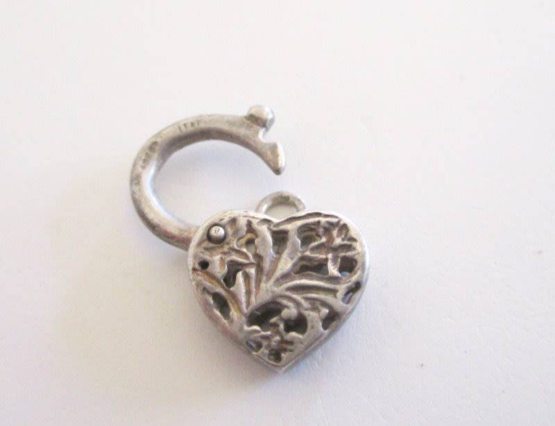VINTAGE STERLING SILVER CHARMS INCLUDING A LOCKET AND A CLASP---WEIGHT 13,8 Gram