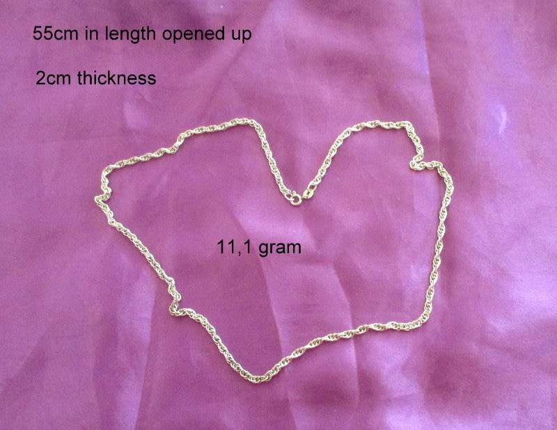 A SOLID SILVER TWISTED ROPE CHAIN--55cm