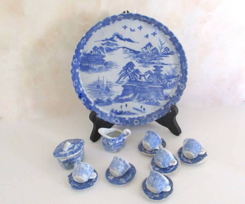 A VICTORIAN SALESMAN'S SAMPLE  PORCELAIN TEA SET ON A TRAY--READ
