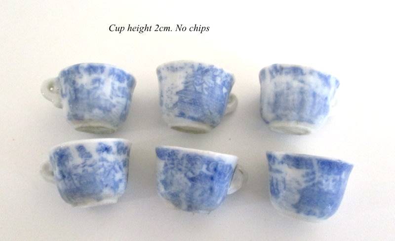 A VICTORIAN SALESMAN'S SAMPLE  PORCELAIN TEA SET ON A TRAY--READ