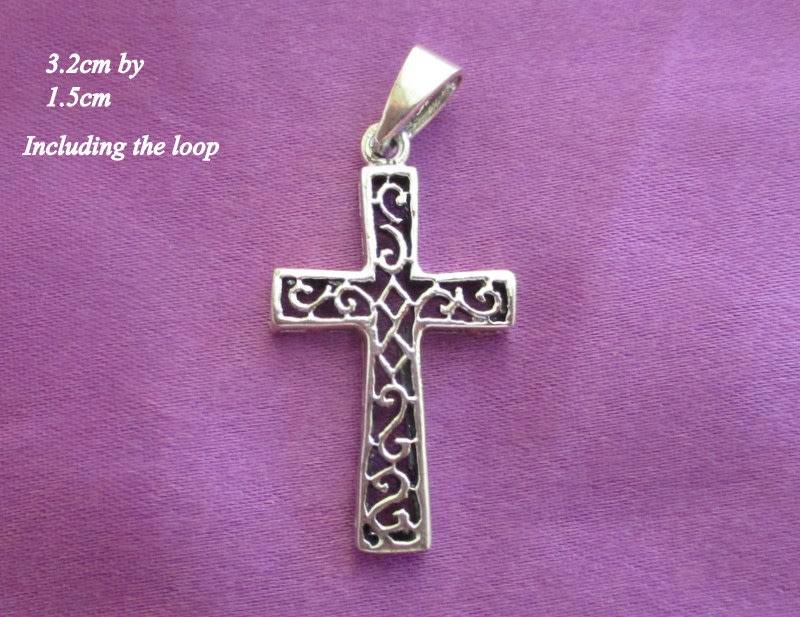 A STERLING ,925 SILVER CROSS--Check your load shedding times