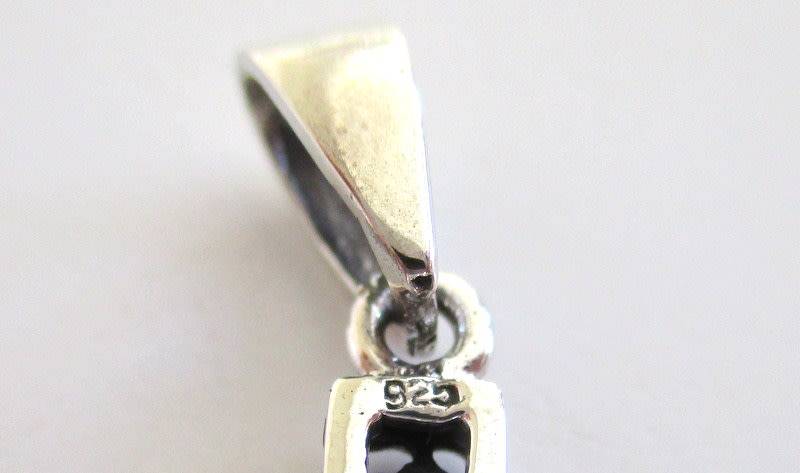 A STERLING ,925 SILVER CROSS--Check your load shedding times