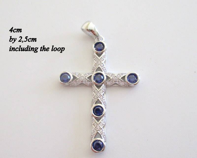 A STERLING ,925 SILVER CROSS