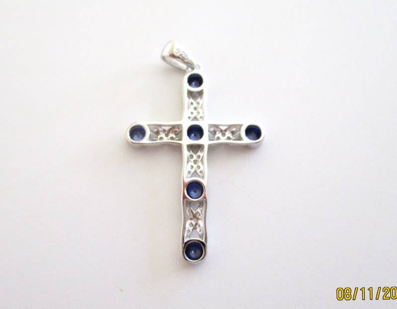 A STERLING ,925 SILVER CROSS