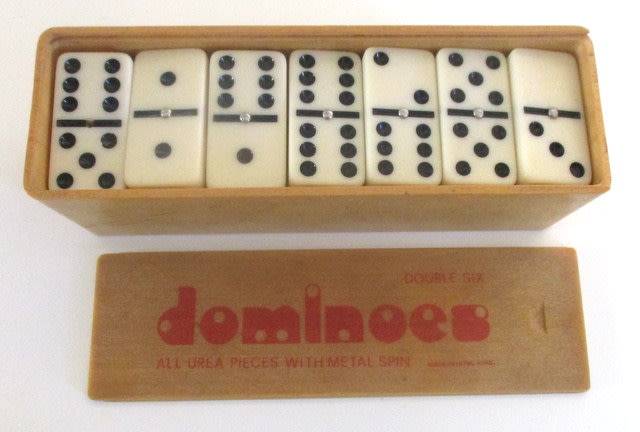 A VINTAGE DOMINO SET,VINTAGE CHARMS,MARBLES AND A VINTAGE GOOFY