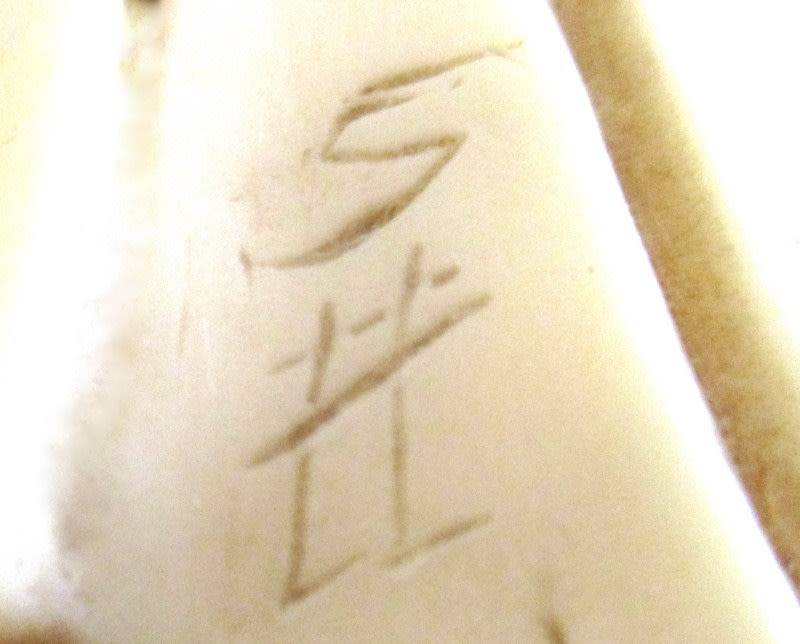 A LARGE ORIENTAL FIGURE OF A FISHERMAN---Signed