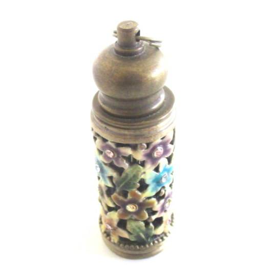 AN ENAMEL AND BRASS PERFUME BOTTLE PENDANT,AN UNUSED POWDER COMPACT ETC