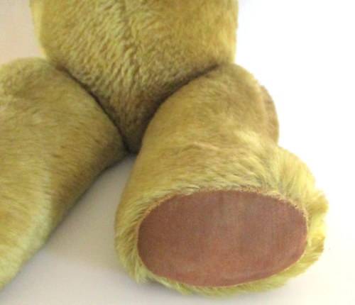 A VINTAGE PLUSH TEDDY BEAR--MAY BE A MERRYTHOUGHT