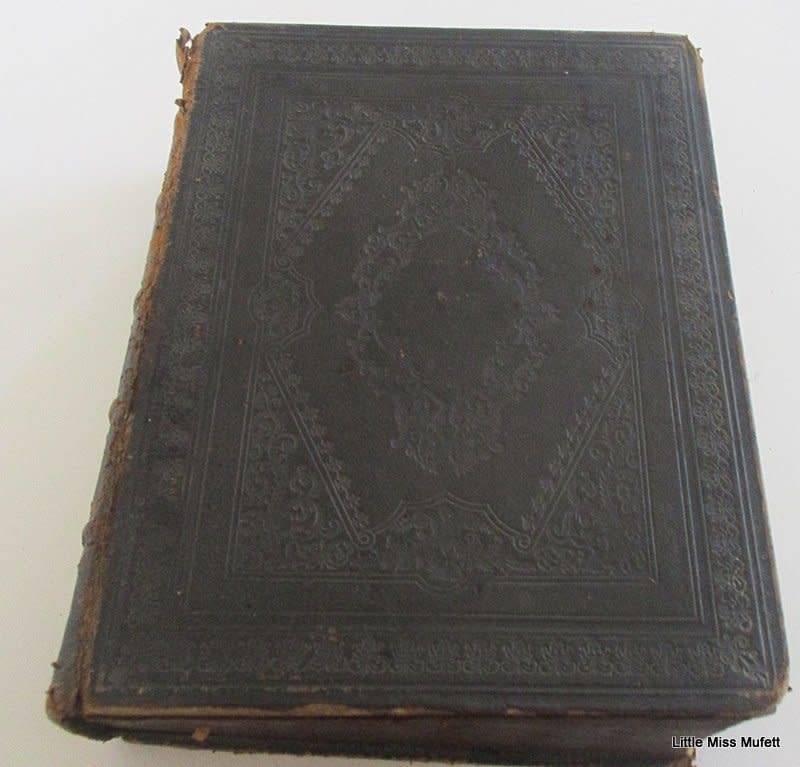 A LARGE FAMILY BIBLE DATED 1856 WITH FAMILY HISTORY
