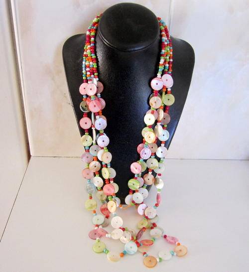 A LONG 3 STRING COLOURFUL MOTHER OF PEARL NECKLACE