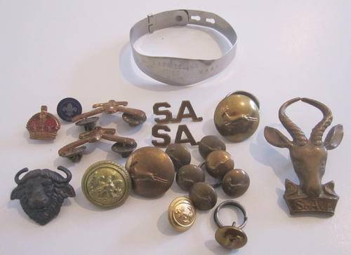 A WAR BRACELET WORN BY A WOMAN AND OTHER MILITARY RELATED ITEMS