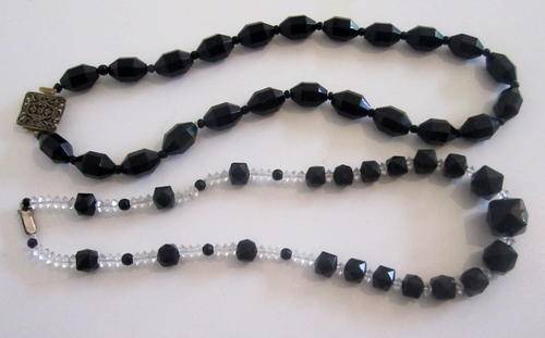 2 STRINGS OF VINTAGE BEADS--BLACK AND CRYSTAL