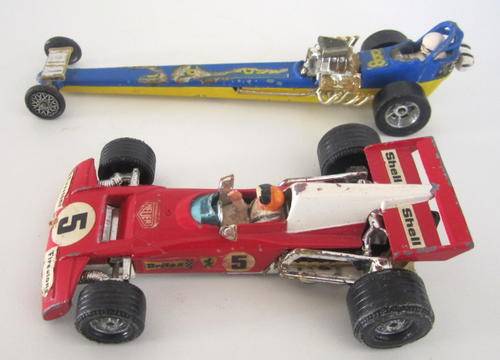 2 CORGI'S FROM 1969--- A FERRARI 312 AND A QUARTERMASTER DRAGSTER.