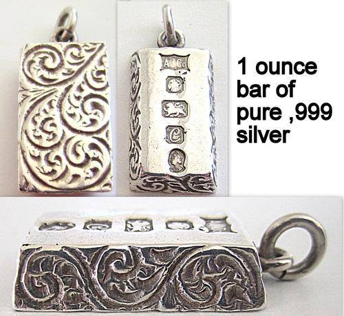 A 1 OUNCE BAR ,999 PURE SILVER EMBOSSED--Note measurements