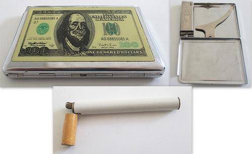 A CIGARETTE CASE / LIGHTER COMBO AND A LIGHTER IN THE FORM AND SIZE OF A CIGARETTE