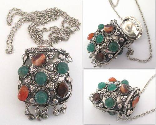 A PERFUME CONTAINER ON A LONG CHAIN WITH SEMI-PRECIOUS STONES