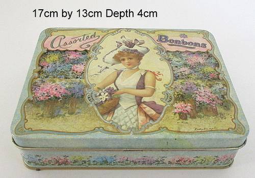 AN OLDE WORLD REPRODUCTION TIN.
