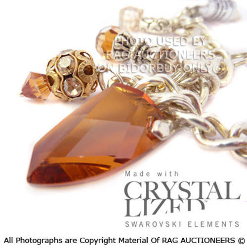 **R600** Elegant GENUINE SWAROVSKI Bracelet In Golds and Coppers