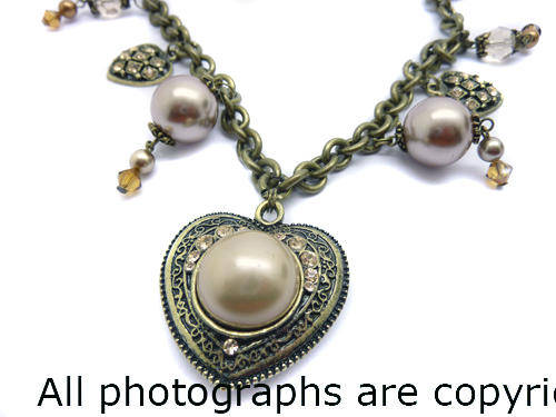 **R720** Swarovski With Detachable Pearl Heart Pendant