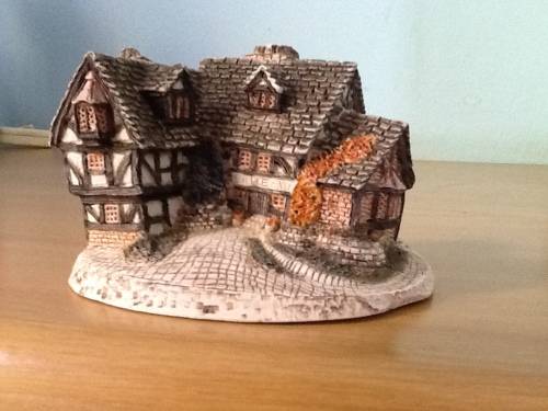 Vintage ornament of  a Tudor house in fine detail