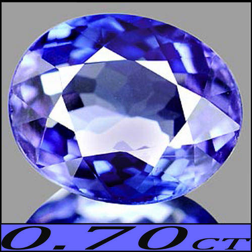 0.70 CT ELEGANT FLAWLESS NATURAL D-BLOCK VIOLET BLUE TANZANITE GEMSTONE POLISHED IN A PRISTINE OVAL.