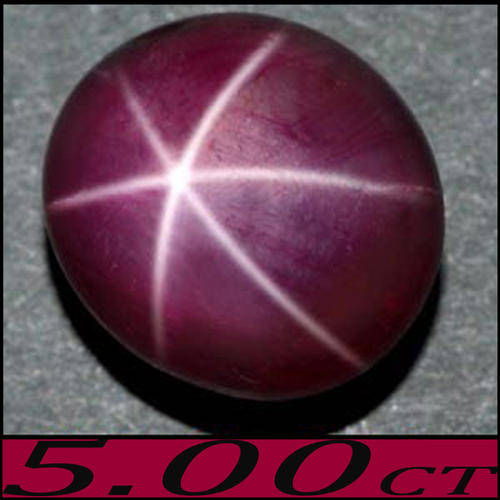 5.00 CT SCINTILLATING SCARLET BLOOD RED STAR RUBY (6-RAYS). A SMOOTH TANZANIAN OVAL CABOCHON GEM .