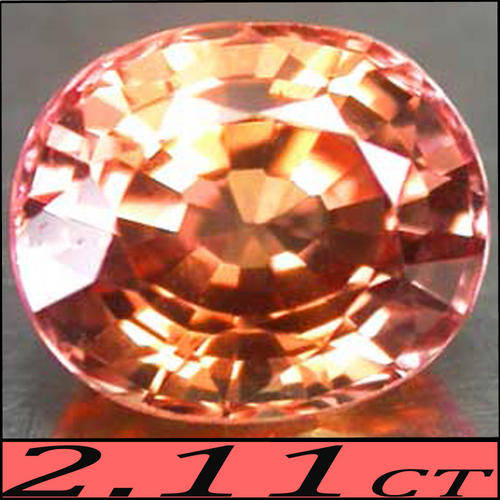 2.11 CT ORANGE PADPARADSCHA, A LOTUS BLOSSOM COLOURED OVAL POLISHED GEMSTONE.