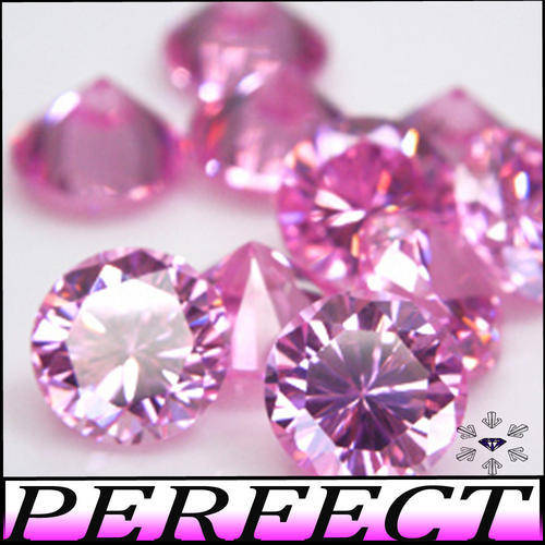 2.20 CT PRETTY PINK PAIR OF BRILLIANT ROUND CALIBRATED DIAMOND SIMULATES. (1.10 CT BY TWO OF 5.5mm)