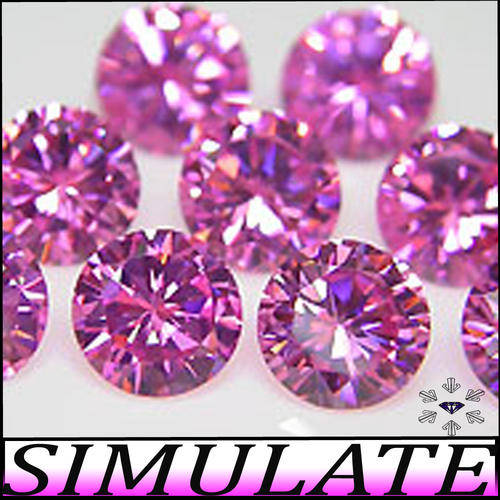 2.20 CT PRETTY PINK PAIR OF BRILLIANT ROUND CALIBRATED DIAMOND SIMULATES. (1.10 CT BY TWO OF 5.5mm)