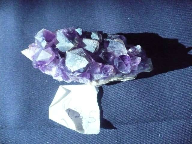 AMETHYST CRYSTAL ON A QUARTZ PLATE