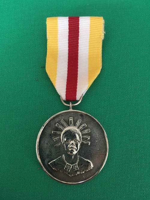 Original and Scarce Full Size SWAZILAND medal for - BRAVERY SERVICE Umbutto defence Force.